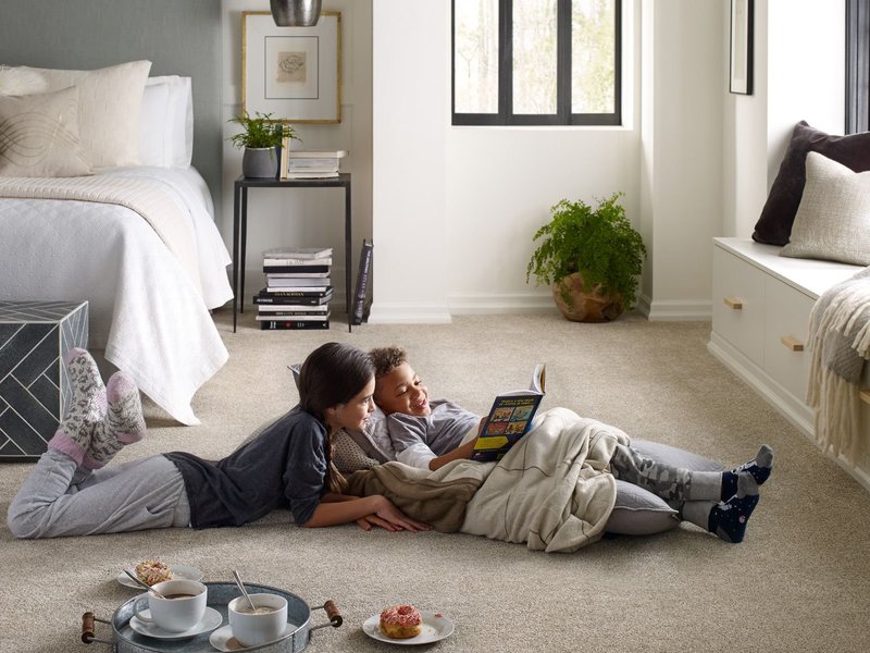Children reading on the carpet - Coastal Floor Covering Inc in Crowley, LA