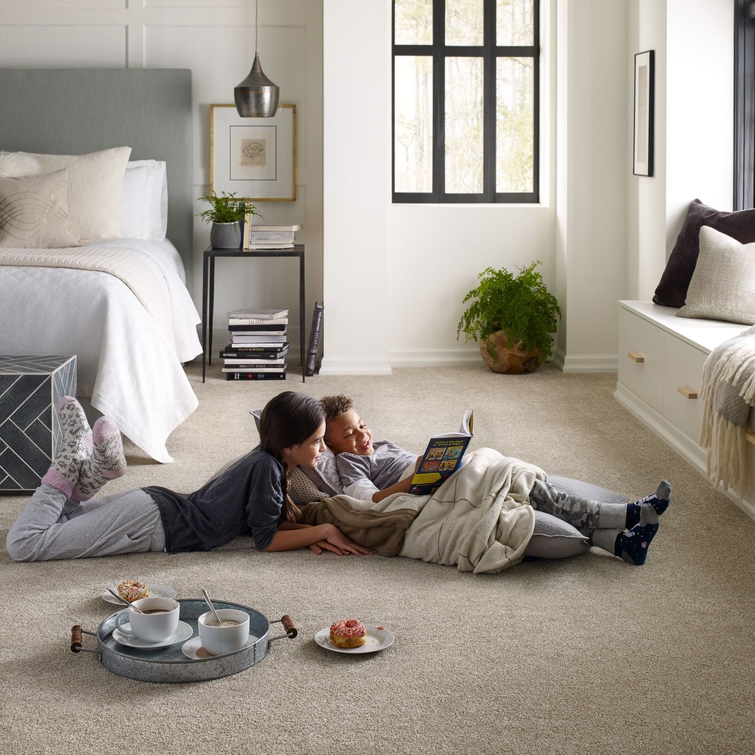 Children reading on the carpet - Coastal Floor Covering Inc in Crowley